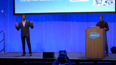 two presenters on stage