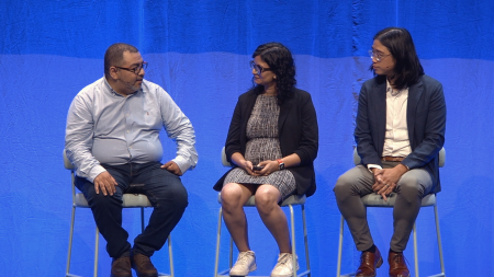 all three panelists on stage