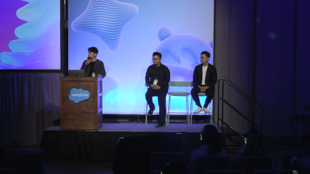 3 people on stage doing a demo