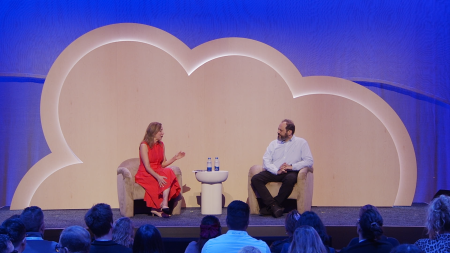 2 panelists sitting on stage