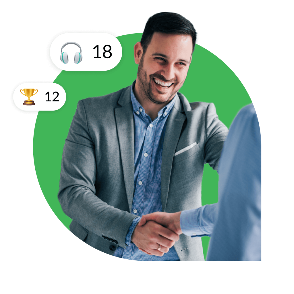 Image of a Customer Success Manager shaking hands with customers they help.