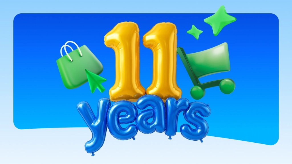3D graphic celebrating an 11th anniversary featuring gold "11" and blue "years" foil balloons, flanked by a green shopping bag, green cursor icon, and shopping cart.