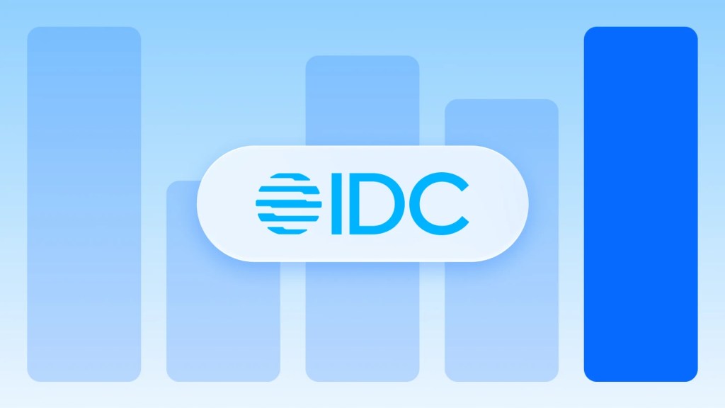 IDC logo with a blue bar graph backdrop