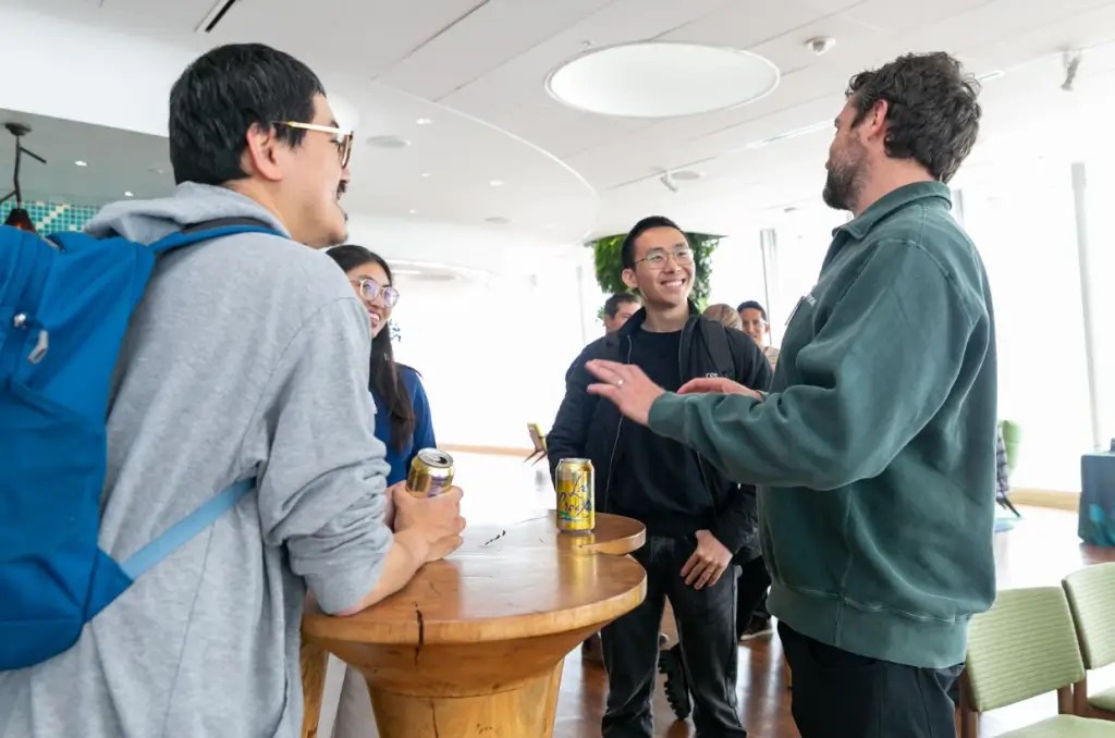 People mingling at event.