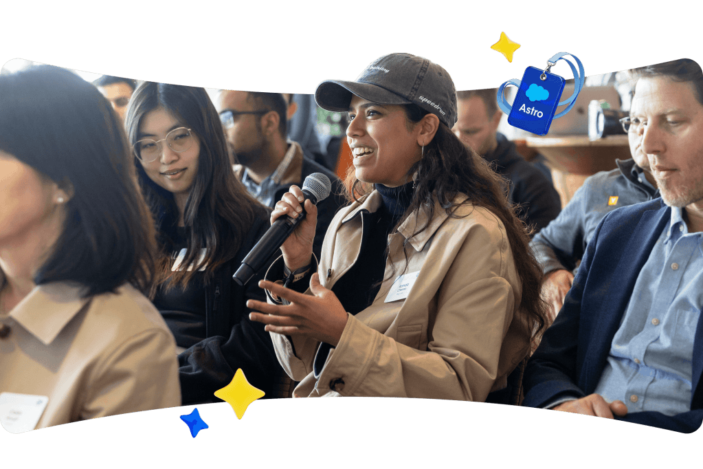 Woman holding a microphone at the Startup Summit.